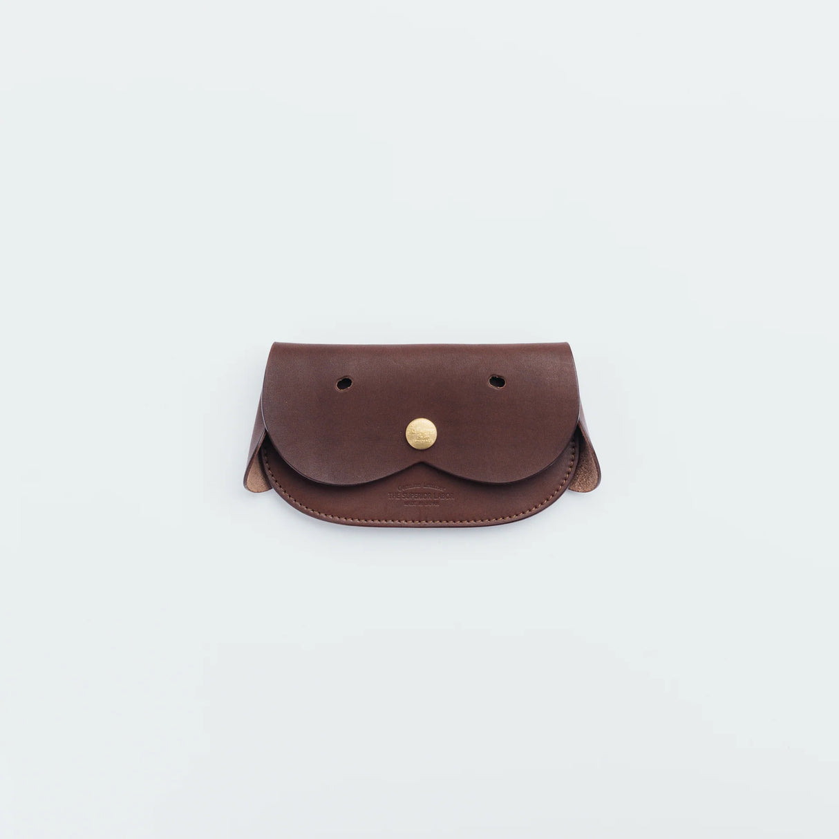A wallet with a dog motif.

It is durable and can be used for many years, and the design is cute and makes a nice accent.