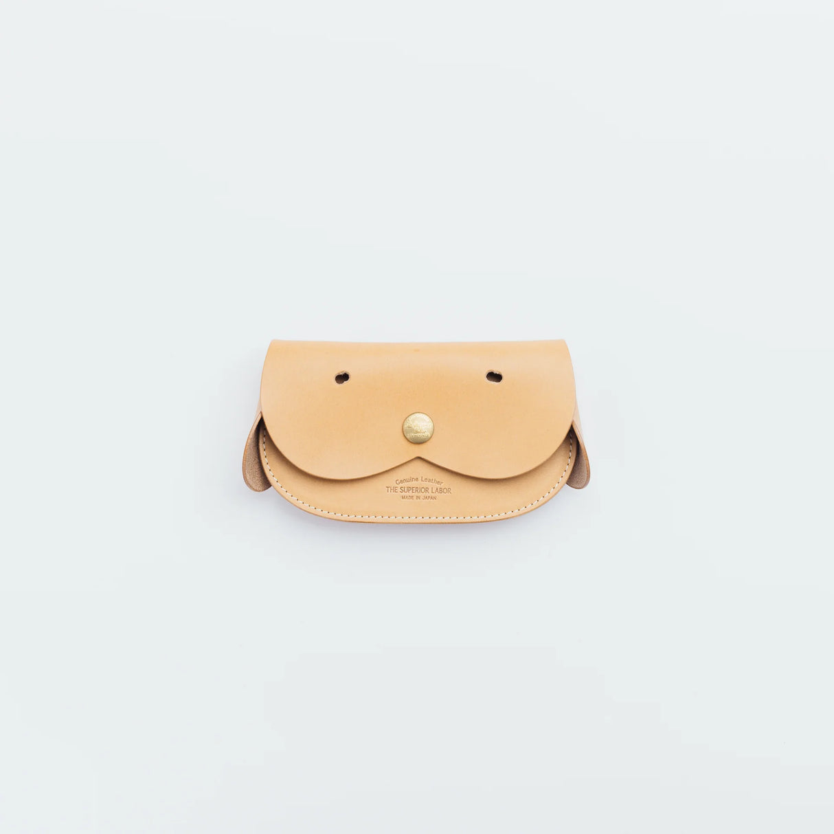 A wallet with a dog motif.

It is durable and can be used for many years, and the design is cute and makes a nice accent.