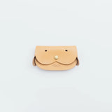 A wallet with a dog motif.

It is durable and can be used for many years, and the design is cute and makes a nice accent.
