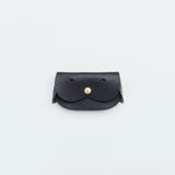 A wallet with a dog motif.

It is durable and can be used for many years, and the design is cute and makes a nice accent.