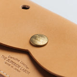 A wallet with a dog motif.

It is durable and can be used for many years, and the design is cute and makes a nice accent.