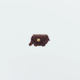 A coin purse with a elephant motif.

It is small enough to carry in your pocket when you are out and about. Compact and sturdy, it can be used for many years, and the design is cute and makes a nice accent.