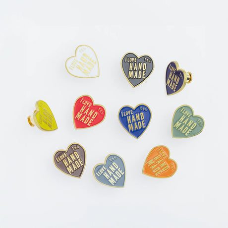 The popular "I love HANDMADE" design, well-known from our patches, is now available as a colorful pin!

It comes in 10 colors, matched to the paint colors of our engineer bags.

The metal parts are made from solid, unplated brass.

As you use it, the brass will develop a natural patina over time—enjoy the changing character that comes with age.

Color: The color you see on your screen may differ from the actual product.

Brass Products

Due to the nature of brass, some areas may appear slightly tarnished du