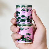 Immerse yourself in the serenity of dusk with the Lotus Silhouette Washi/PET Tape. This tape captures the quietest moment on the pond, right as the sun dips below the horizon. The design features elegant lotuses floating on calm water, their usual bright colors softened into a deep, romantic pink by the fading sunset light. These aren't just flowers; they are reflections of the sky, "blushing" in the twilight.