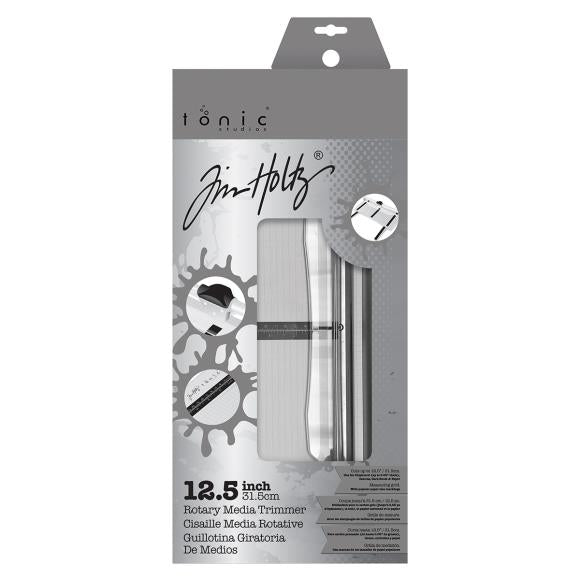Featuring a geared rotary cutting blade, this trimmer effortlessly cuts through a range of crafting mediums. The trimmer offers both imperial and metric rulers, as well as a handy 0.25 inch gridded base with popular paper sizes for ease of use. With a compact base that has a cutting length of 12.5 inch/31.5cm and extendable arms that can expand it to 12 inch/30.5cm, this trimmer is both versatile and practical.