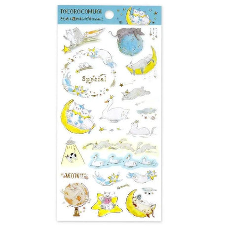 A sticker sheet with cute cats exploring and resting all throughout the starry night designed by Tokoro Komugi who is known for their soft style of illustration featuring animals! Perfect for decorating letters, notebooks, and more!