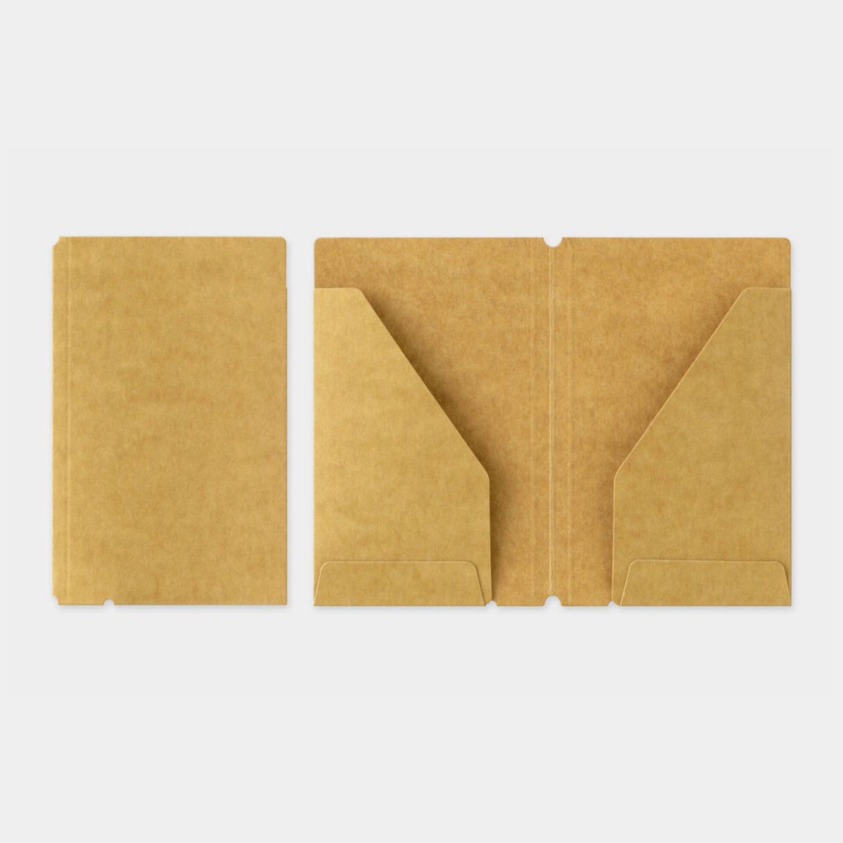 To commemorate this 20th anniversary, we’ve created a new size of TRAVELER’S notebook.

It is TRAVELER’S notebook Card Size. This TRAVELER’S notebook is always with you, even in your daily life. Whether it’s a sudden idea, information you learned or overheard, or something important you don’t want to forget— whenever and wherever you feel like writing, you can quickly grab the notebook and jot it down.

This set includes TRAVELER’S notebook Card Size, Refill Notebooks, Cotton Zipper Case, Kraft Paper Folder