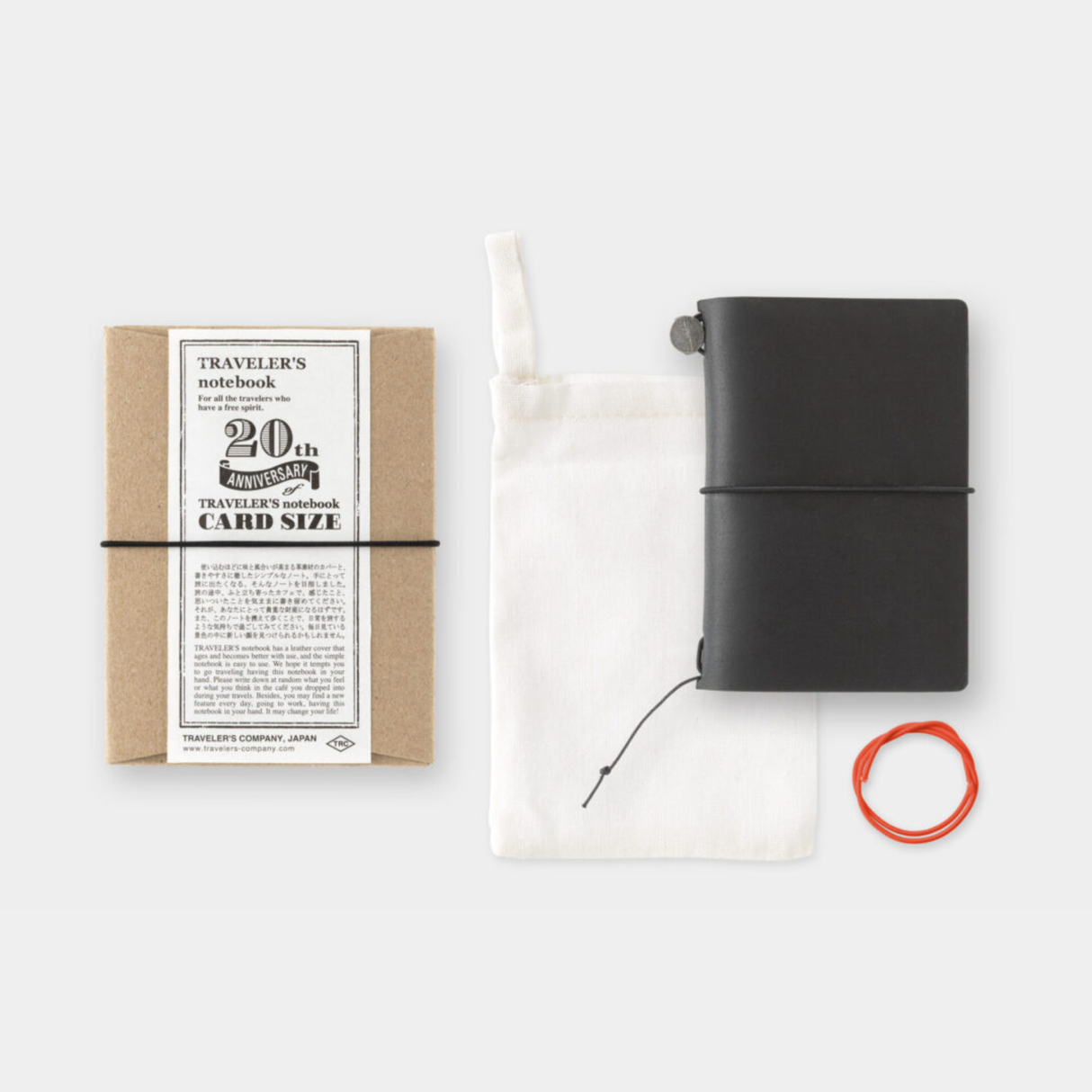 To commemorate this 20th anniversary, we’ve created a new size of TRAVELER’S notebook.

It is TRAVELER’S notebook Card Size. This TRAVELER’S notebook is always with you, even in your daily life. Whether it’s a sudden idea, information you learned or overheard, or something important you don’t want to forget— whenever and wherever you feel like writing, you can quickly grab the notebook and jot it down.

This set includes TRAVELER’S notebook Card Size, Refill Notebooks, Cotton Zipper Case, Kraft Paper Folder