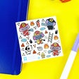 PipStickers are the PERFECT gift for the sticker lover in your life - even if it's you! These unique PVC designs with silver foil accents come on a clear backing and cannot be found anywhere else.

Includes one 4" x 4" sheet of Trunks & Ladders PipStickers and includes the Pipsticks manifesto.

