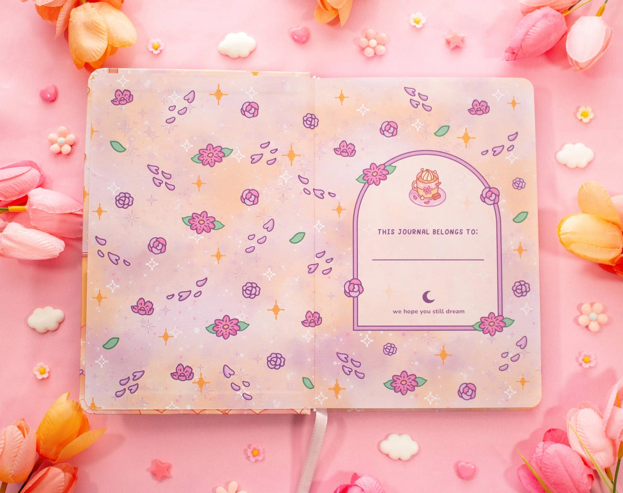 ✧Size &amp; Materials✧

Size: A5 (approximately 5.8 x 8.3 inches)
Smooth hardcover, rounded corners
160 dot grid pages, 140 gsm
Includes ribbon bookmark, elastic band, and back pocket