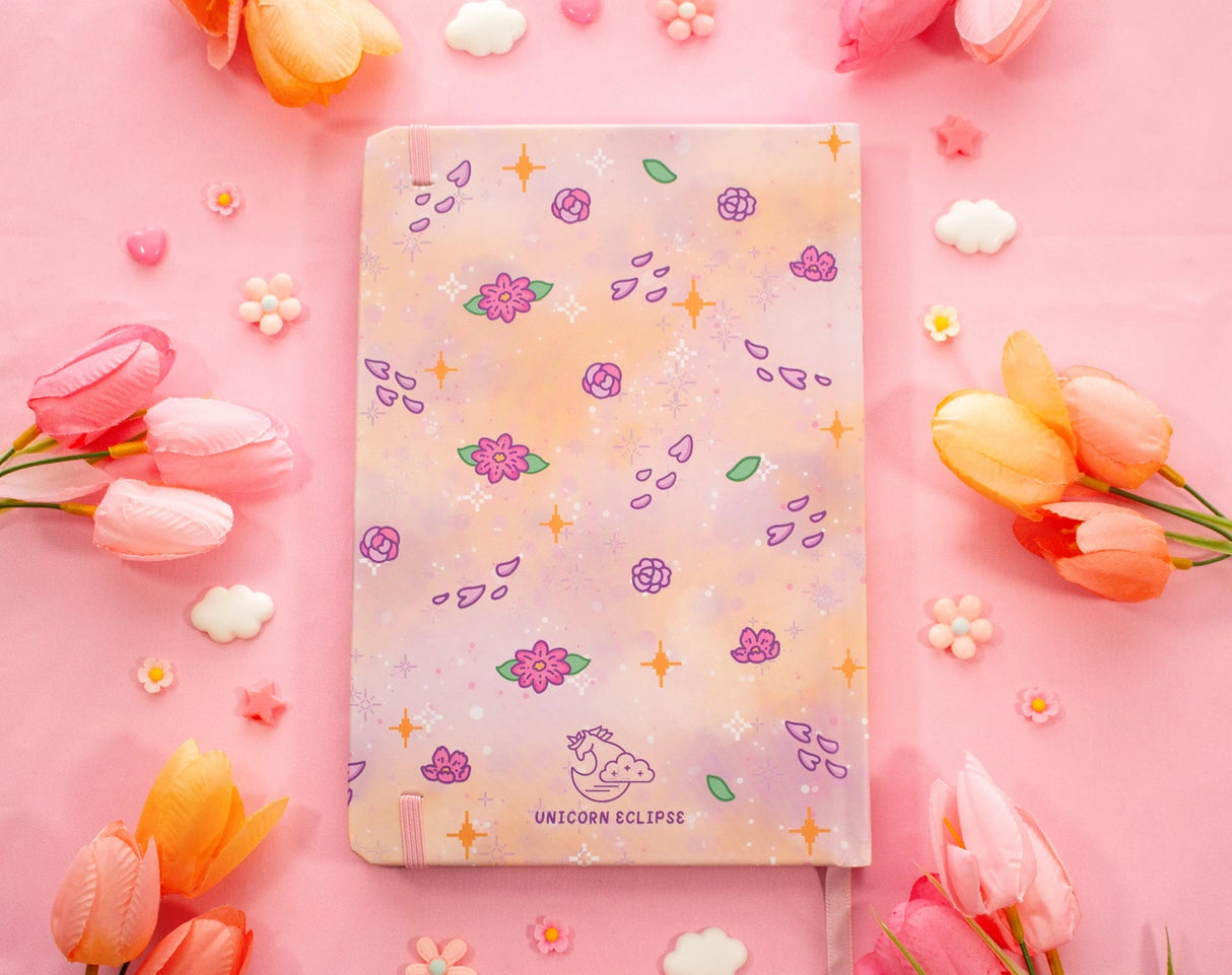 ✧Size &amp; Materials✧

Size: A5 (approximately 5.8 x 8.3 inches)
Smooth hardcover, rounded corners
160 dot grid pages, 140 gsm
Includes ribbon bookmark, elastic band, and back pocket