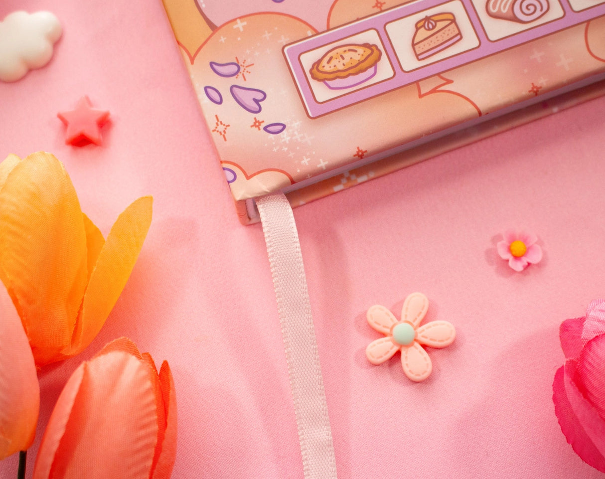 ✧Size &amp; Materials✧

Size: A5 (approximately 5.8 x 8.3 inches)
Smooth hardcover, rounded corners
160 dot grid pages, 140 gsm
Includes ribbon bookmark, elastic band, and back pocket