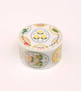 Cinta washi con emblema floral blanco