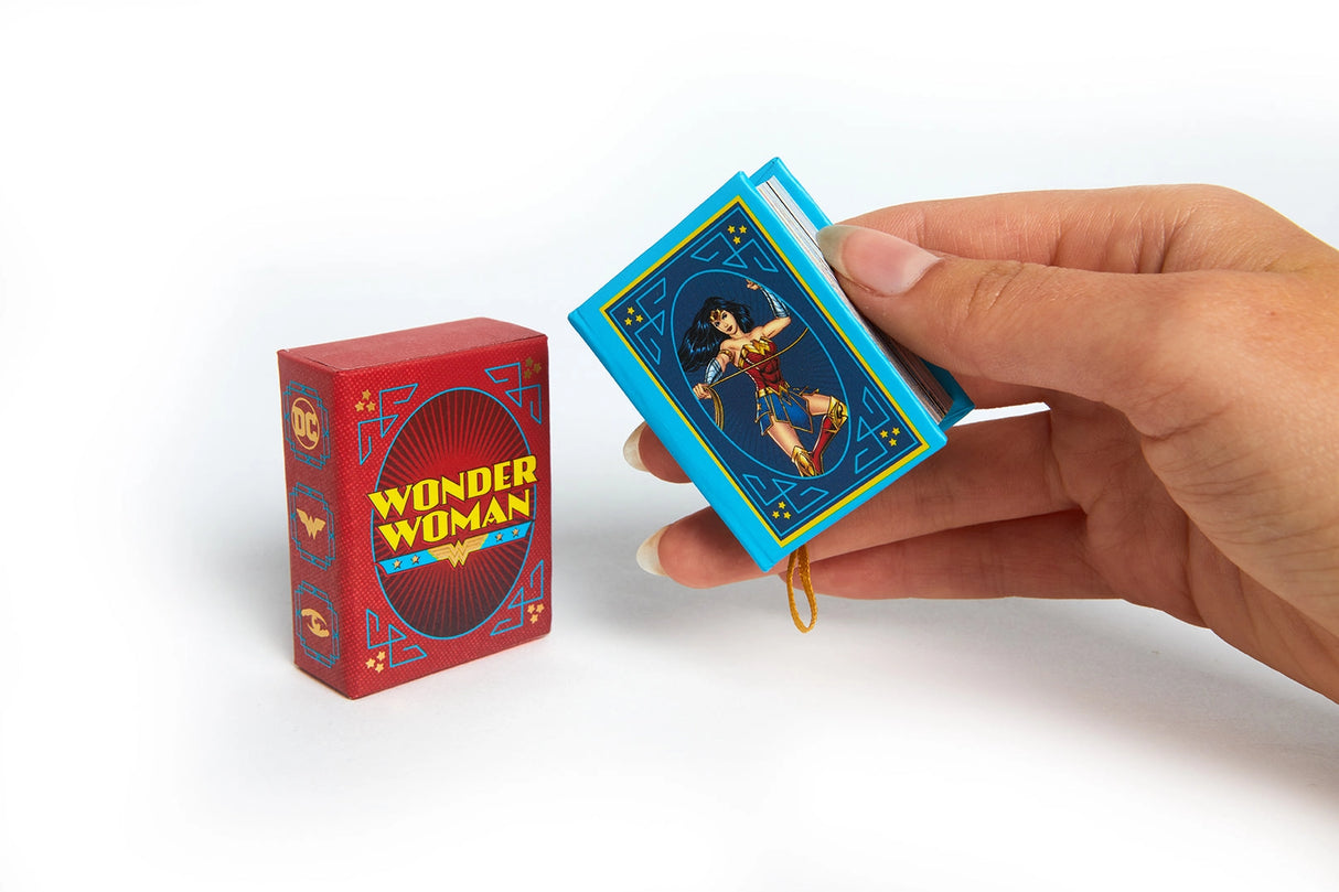 Since her debut in All Star Comics in 1941, Wonder WomanTM has endured as a beacon of strength, truth, and peace. Now, fans of the Princess of the Amazons can rediscover her best moments in this miniature art book. 

Features & Highlights: 

Empowering quotes to inspire Wonder Woman fans everywhere

Iconic moments in Wonder Woman’s comics history, including covers, panels, and other iconic art spanning nearly 80 years of Wonder Woman comics

Pocket-Sized, this book fits right in your pocket, perfect for Ama