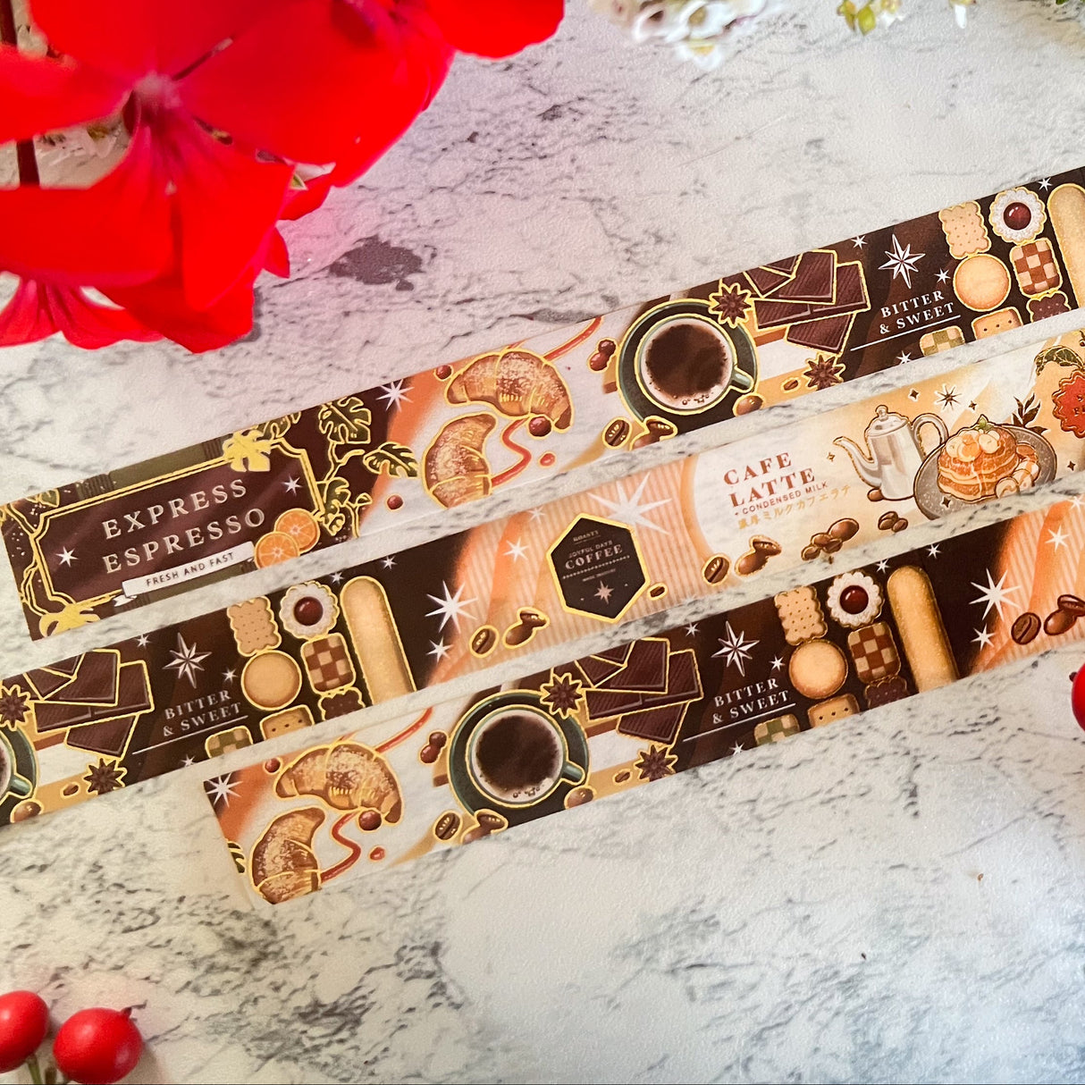 Pegushi Washi Tape - Gold Foil Coffee
15mm x 5m long washi tape
7 repeating patterns
Peggy is an illustrator, designer and Background Painter in TV animation specializing in vibrant colorful drawings and gold foil. Her work is inspired by Chinese folklore imagery she grew up with and wishes to spread her interpretation of her culture. She also has a great fondness for the ocean and all marine life, and hope to spread the love for all water dwelling creatures.