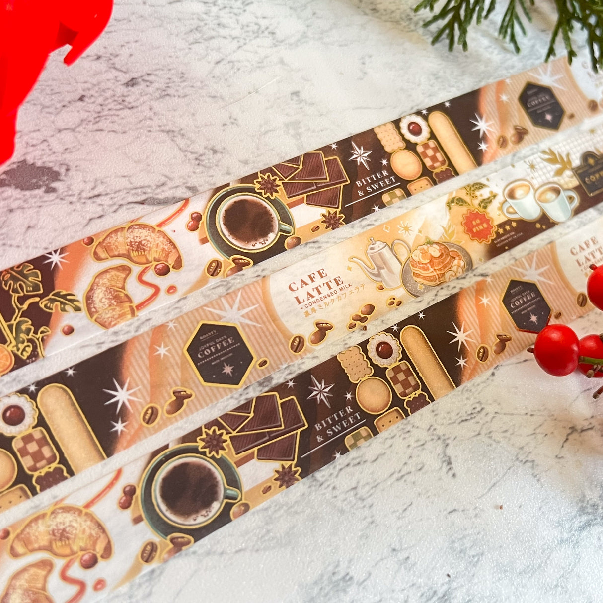 Pegushi Washi Tape - Gold Foil Coffee
15mm x 5m long washi tape
7 repeating patterns
Peggy is an illustrator, designer and Background Painter in TV animation specializing in vibrant colorful drawings and gold foil. Her work is inspired by Chinese folklore imagery she grew up with and wishes to spread her interpretation of her culture. She also has a great fondness for the ocean and all marine life, and hope to spread the love for all water dwelling creatures.