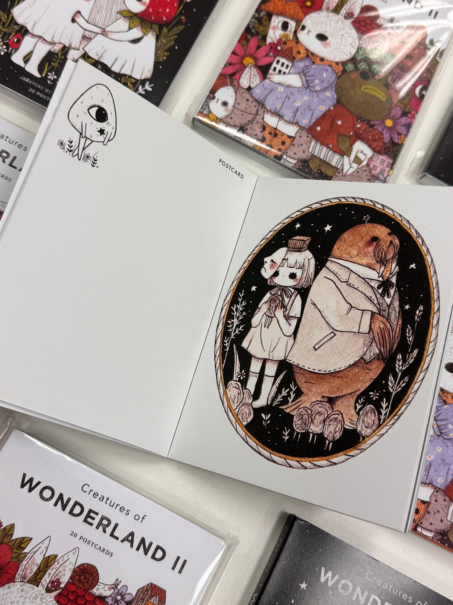 jb0xtchi Postcard Set - Creatures of Wonderland

The Creatures of Wonderland Postcard Set includes 20 postcards featuring artwork illustrated by jb0xtchi (Jessica Ng). jb0xtchi creates stationary and small trinkets from whimsical ideas in the form of painting using ink, watercolor, and gouache.

6in x 4in postcards
20 different designs
All artwork done by Jessica Ng