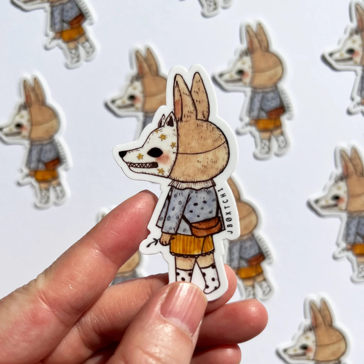 jb0xtchi Vinyl Sticker - Rabbit With Mask

The rabbit with mask vinyl sticker was illustrated by jb0xtchi (Jessica Ng). jb0xtchi creates stationary and small trinkets from whimsical ideas in the form of painting using ink, watercolour, and gouache.