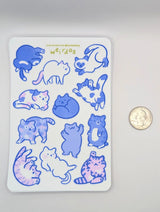 Featuring 12 adorably pudgy cats, each one sporting its own quirky personality, this 4"x6" vinyl sticker sheet is perfect for adding a touch of whimsy to your everyday items. From the cat who’s too cool for school to the one who’s just a little bit offbeat, these weirdos celebrate the joy of being different.
