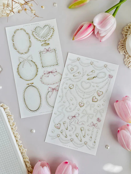 leelajournals Pearls &amp; Frames Sticker Sheet - 2pc Set

♡ 2pc sticker sheet set - 2 large&nbsp;

♡ pet matte (clear)

♡ all sheet dimensions estimated: L: 4x7 (in) | S: 4x3 (in)
