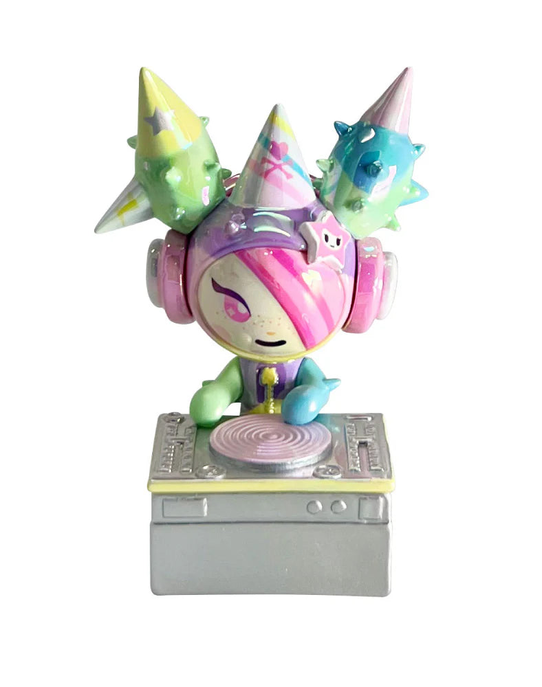 Celebrate 20 years of tokidoki with our 20th Anniversary Blind Box! This series features iconic characters reimagined in party-ready designs, including Donutella, Nijiko, Mozzarella, Adios, Mermicorno, and more—plus a special chaser, Party Bubbly! Join the celebration of two decades of signature & artwork, unforgettable characters, and kawaii culture with this must-have blind box collection for every tokidoki fan!