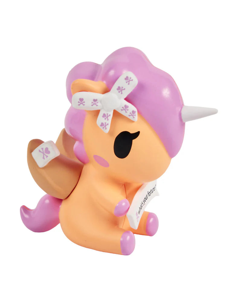 Good vibes and cute surprises are in your future!&nbsp; Each Fortune Cookie Unicorno Blind Box reveals one surprise figure and a special fortune inside!&nbsp; Open to discover which Unicorno destiny has chosen for you!&nbsp; With 9 adorable designs, each Unicorno is filled with sweetness, sparkle, and a touch of good luck!&nbsp; Collect them all and see what fortune awaits!
